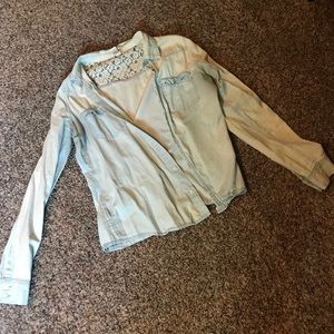 Distressed denim jacket.